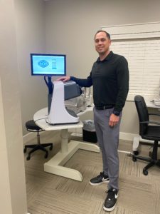 Dr. Hurley with the NMD2 Neurolens measurement device. He says Neurolens has been a game-changer for both his patients and his practice.