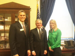 Optometrist stands with his U.S. congressional representative and a colleague optometrist advocating for the passage of the Dental and Optometric (DOC) Access Act.