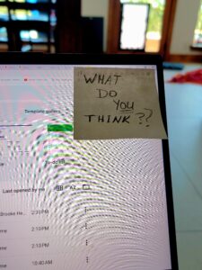 An optometrist shares the reminder note she sticks on her computer that reminds her to ask employees what they think about how to solve problems.
